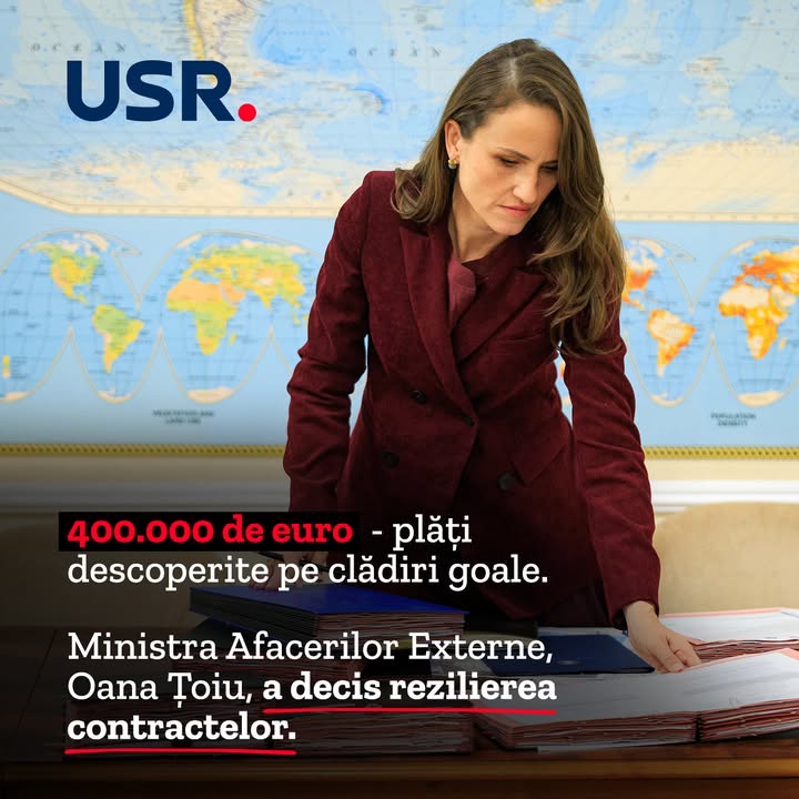 Oana Țoiu, ministrul afacerilor externe, analizând dosare ale MAE, pe fundalul unei hărți a lumii